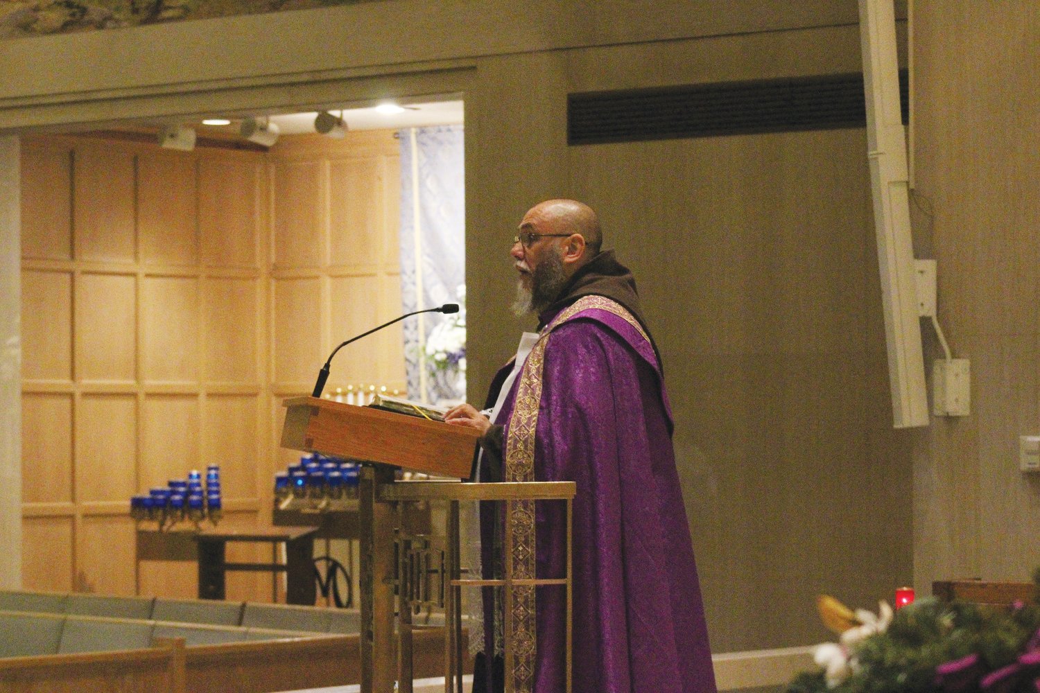 Father David Mary Engo speaks at St. Pius V Church in Providence. From December 5-7, the diocesan Eucharistic Revival hosted a Eucharistic Advent Mission offered by Father Engo, a Franciscan friar and national preacher.